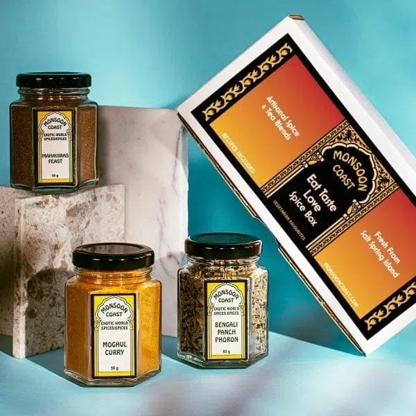 Eat Taste Love Spice Box shown with jars - Mahavira's Feast, Moghul Curry, and Bengali Panch Phoron