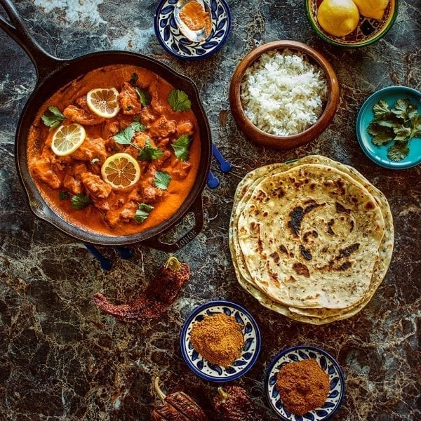 Butter Chicken served with rice and naan