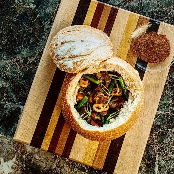 South African Beef Curry in a bread bowl